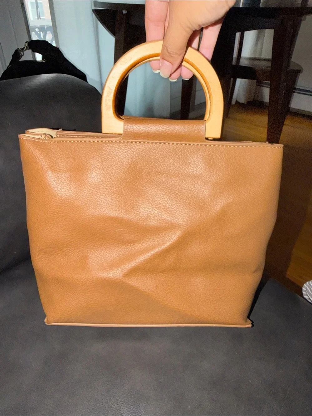 Brown purse with wooden tote handles